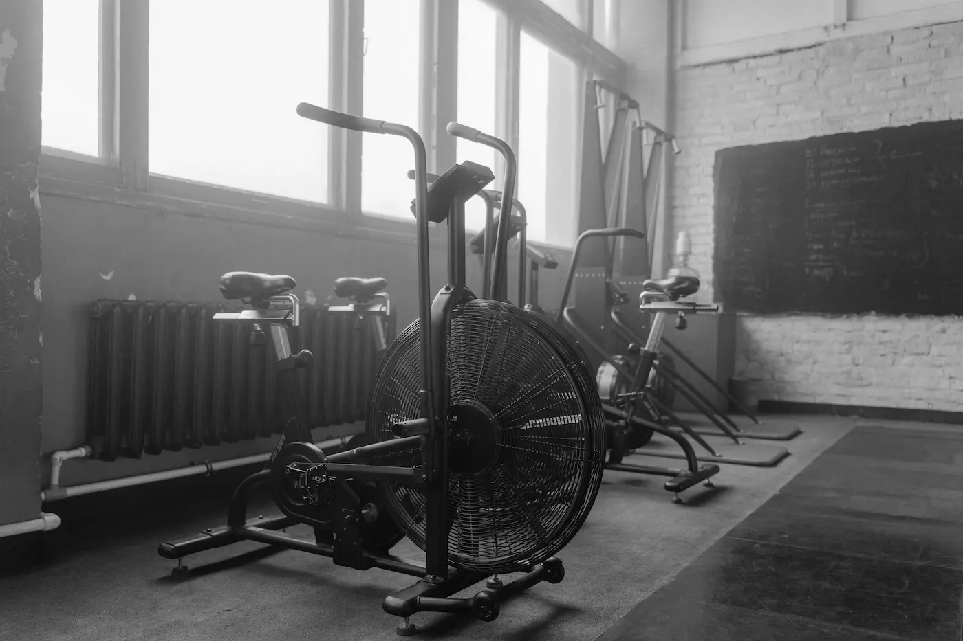 Commercial gym equipment and air bikes in a fitness club